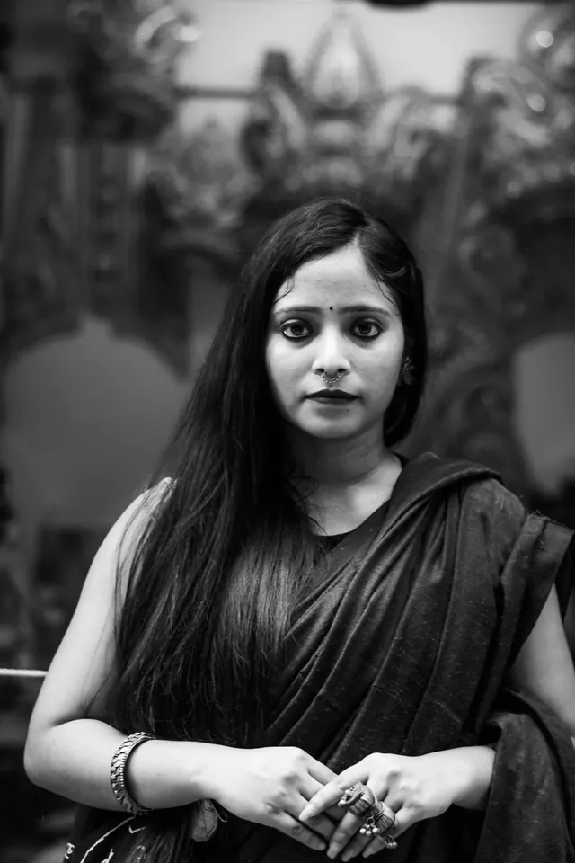 A quiet black-and-white fashion portrait